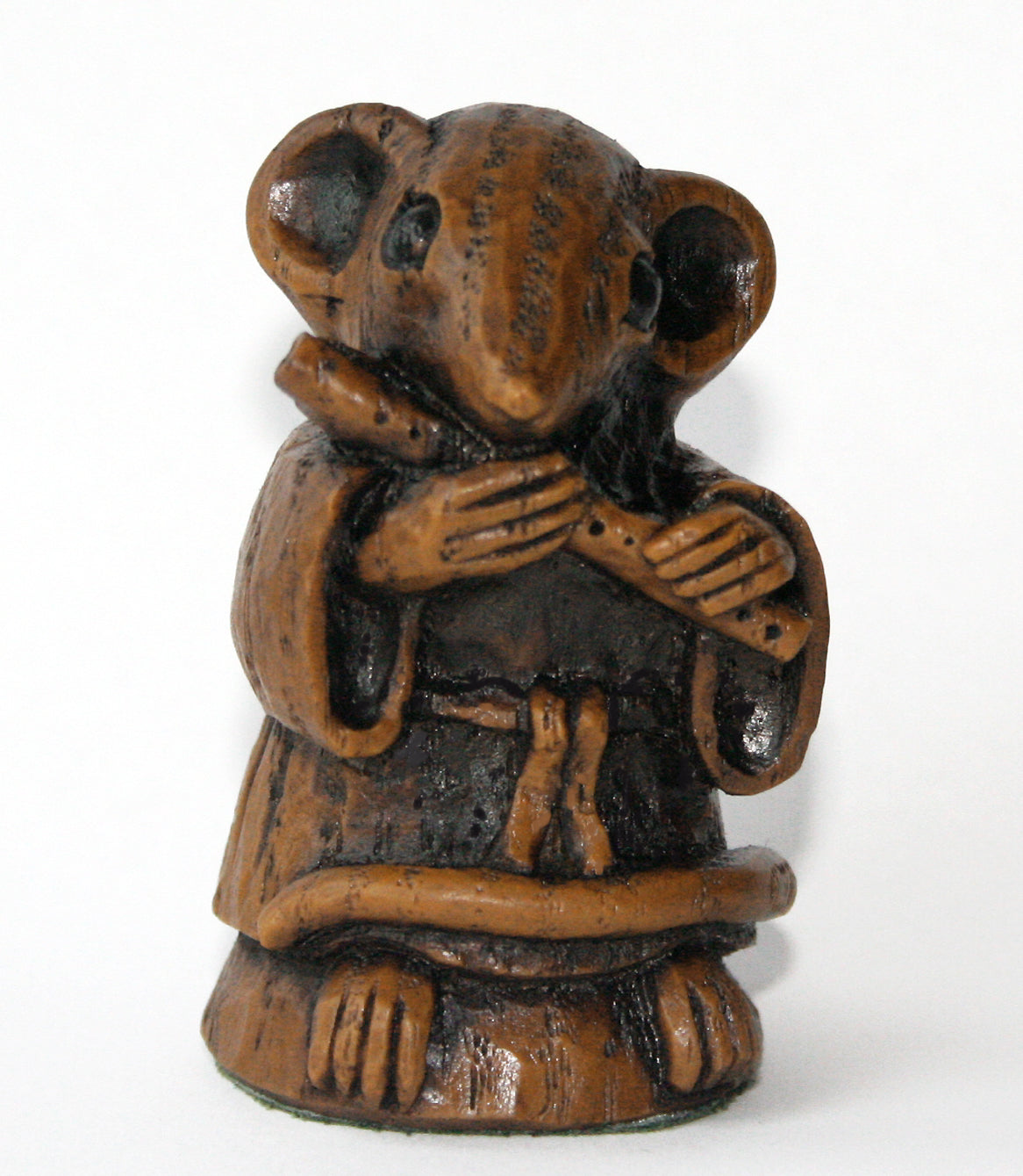 mouse figurine playing a flute front view